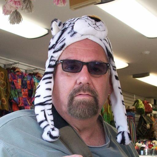 J.S. Gilbert casual with tiger hat